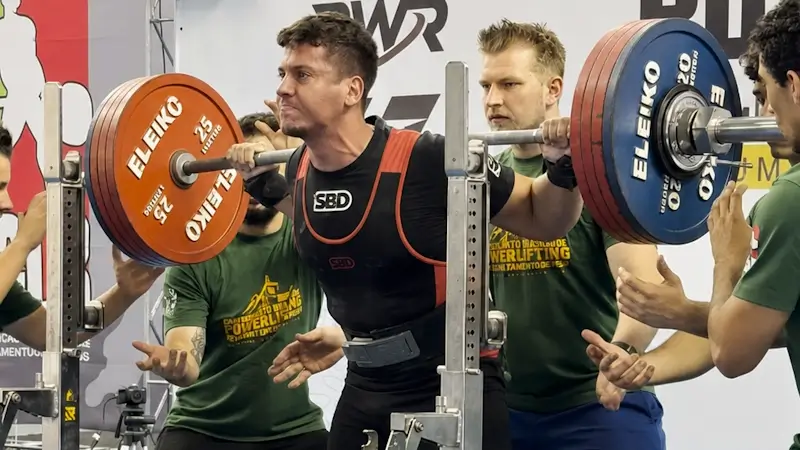 Powerlifting athlete during a squat